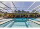 Stunning pool with screened enclosure and fountain features at 2420 Kent Pl, Clearwater, FL 33764