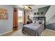 Cozy bedroom with window seat and geometric wall art at 32560 Osprey Peak Way, San Antonio, FL 33576