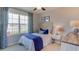 Bright bedroom with lake view and stylish decor at 32768 Osprey Peak Way, San Antonio, FL 33576