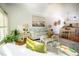 Open concept living room with hardwood floors and comfortable seating at 4630 Mirabella Ct, St Pete Beach, FL 33706
