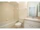 Clean bathroom with tub, toilet and vanity with sink at 4630 Mirabella Ct, St Pete Beach, FL 33706