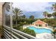 Community pool with a relaxing gazebo and plenty of lounge chairs at 4630 Mirabella Ct, St Pete Beach, FL 33706