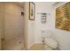 Bathroom with toilet and walk in shower at 4630 Mirabella Ct, St Pete Beach, FL 33706