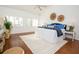 Spacious main bedroom with hardwood floors and plenty of natural light at 4630 Mirabella Ct, St Pete Beach, FL 33706