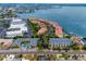 Aerial view of community near water and beach at 4630 Mirabella Ct, St Pete Beach, FL 33706