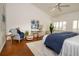 Bright and airy main bedroom with hardwood floors and plenty of natural light at 4630 Mirabella Ct, St Pete Beach, FL 33706