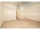 Well-lit bedroom featuring carpet flooring and ample closet space at 4630 Mirabella Ct, St Pete Beach, FL 33706
