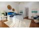 Spacious main bedroom with hardwood floors and stylish decor at 4630 Mirabella Ct, St Pete Beach, FL 33706