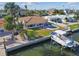 Single-story home on waterfront property with boat dock at 529 Johns Pass Ave, Madeira Beach, FL 33708