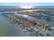Aerial view showcasing a waterfront home with canal access at 529 Johns Pass Ave, Madeira Beach, FL 33708