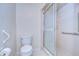 Bathroom with toilet and walk in shower at 6712 Holly Ct, Zephyrhills, FL 33542