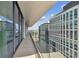 Private balcony with glass railings and city views at 1000 Water St # 1702, Tampa, FL 33602