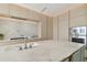 Modern kitchen with marble countertops and stainless steel appliances at 1000 Water St # 1702, Tampa, FL 33602