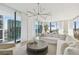 Elegant living room with ample natural light and city views at 1000 Water St # 1702, Tampa, FL 33602