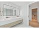 Bathroom with marble finishes, double vanity and walk-in closet at 1000 Water St # 1702, Tampa, FL 33602