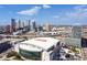 Aerial view of the city with a large stadium at 1000 Water St # 1702, Tampa, FL 33602