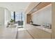 Modern kitchen with marble countertops and city views at 1000 Water St # 1702, Tampa, FL 33602