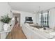 Spacious living room with light flooring and a modern sectional sofa at 1000 Water St # 1702, Tampa, FL 33602