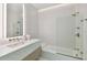 Clean bathroom with a bathtub, shower, and modern vanity at 1000 Water St # 1702, Tampa, FL 33602