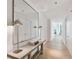 Bright entryway with large mirror and modern console table at 1000 Water St # 1702, Tampa, FL 33602