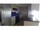View of kitchen with stainless steel appliances and cabinetry at 3706 Joe Sanchez Rd, Plant City, FL 33565