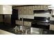 Kitchen with stainless steel appliances at 3706 Joe Sanchez Rd, Plant City, FL 33565