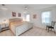 Bright bedroom with king-size bed and window at 3840 Staysail Ln # 3840, Holiday, FL 34691