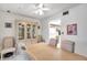 Dining room features a table, chairs, and a china cabinet at 3840 Staysail Ln # 3840, Holiday, FL 34691