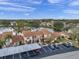 Aerial of condo community by lake at 3840 Staysail Ln # 3840, Holiday, FL 34691