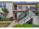 Inviting condominium with well-maintained landscaping and welcoming staircase at 3840 Staysail Ln # 3840, Holiday, FL 34691