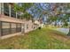 Backyard of property with lake view at 3840 Staysail Ln # 3840, Holiday, FL 34691