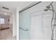 Clean bathroom with a shower and tiled floor at 3840 Staysail Ln # 3840, Holiday, FL 34691