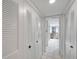 Hallway with built-in storage and tiled floor at 3840 Staysail Ln # 3840, Holiday, FL 34691