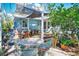 Outdoor patio with dining table and chairs under pergola at 4302 W Obispo St, Tampa, FL 33629