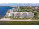 Aerial view of waterfront condo building, highlighting its location at 5281 Isla Key S Blvd # 206, St Petersburg, FL 33715