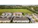 Aerial view of townhouses and surrounding landscape at 5315 Companion Ln, Tampa, FL 33619