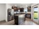 Modern kitchen with stainless steel appliances and island at 5315 Companion Ln, Tampa, FL 33619