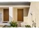Home exterior with double doors and landscaping at 5315 Companion Ln, Tampa, FL 33619