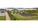 Community playground with covered pavilion and play structures at 5315 Companion Ln, Tampa, FL 33619