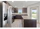 Modern kitchen with stainless steel appliances and island at 5315 Companion Ln, Tampa, FL 33619