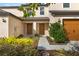 Front view of two-story home with landscaping at 5315 Companion Ln, Tampa, FL 33619