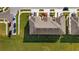 Top-down view of townhouse roofs and surrounding landscape at 5315 Companion Ln, Tampa, FL 33619