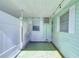 Covered patio with a view of a white fence at 5330 Vera St, Zephyrhills, FL 33542