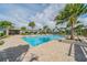 Relaxing pool area with palm trees and lounge chairs at 5625 Del Coronado Dr, Apollo Beach, FL 33572