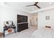 Spacious main bedroom with large TV and a dressing vanity at 5625 Del Coronado Dr, Apollo Beach, FL 33572