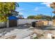 Fenced backyard with patio, shed, and small grilling area at 7695 17Th N Way, St Petersburg, FL 33702