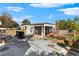 Backyard view showcasing patio, landscaping, and storage at 7695 17Th N Way, St Petersburg, FL 33702