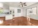 Bright living room with tile floors and a kitchen view at 7695 17Th N Way, St Petersburg, FL 33702