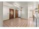 Clean entryway with tile floors and access to bathroom and other rooms at 7695 17Th N Way, St Petersburg, FL 33702