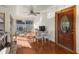 Sunlit Florida room with table, chairs, and sliding door access at 7695 17Th N Way, St Petersburg, FL 33702